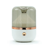 AW GIFTS Urban Aroma Diffuser in white and bronze with USB connection, featuring color-changing LED lights for a modern aromatherapy accessory.
