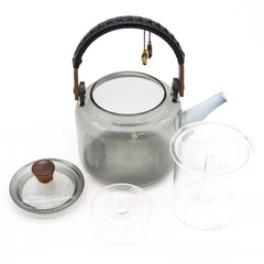 Glass infuser teapot with steamer system, 1000ml capacity, featuring a charcoal-colored lid and handle, perfect for brewing loose leaf tea.