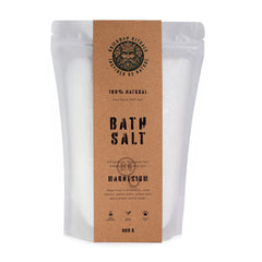 Ancient Wisdom Greenman Rituals Magnesium Epsom Bath Salt in a clear jar, showing vibrant green crystals for relaxing bath soaks.