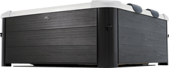 Viking Fitness MSpa Oslo Plus outdoor hot tub with seating and controls, set up outdoors for relaxing spa experience.