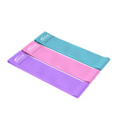 Set of Genius Nutrition Resistance Bands GG-1 for fitness exercises, showing colorful elastic resistance bands on a white background.