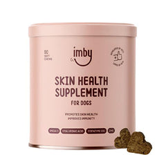 IMBY Skin Health dog supplement bottle with label showing natural ingredients and product details for supporting canine skin.
