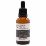 AW Gifts Vitamin C Facial Serum in 30ml bottle, a skincare product with bright orange liquid and dropper applicator.