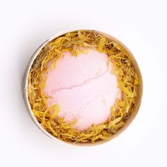 Frankincense and rose bath bomb from AW GIFTS with fragrant, colorful floral design and soothing bath ingredients.