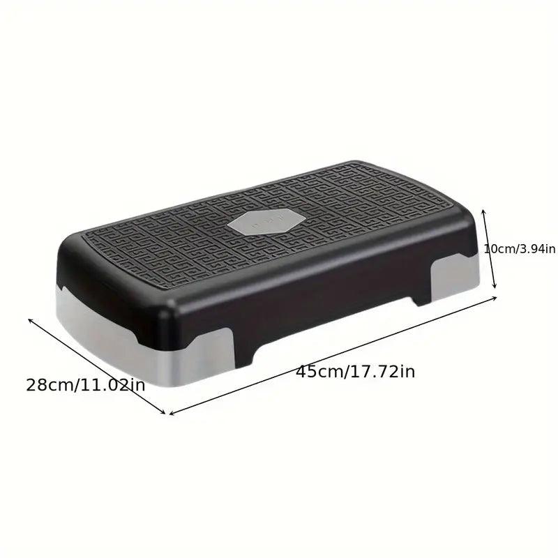 Close-up of TEMU fitness pedal accessory showing textured surface and adjustable strap for indoor exercise equipment.