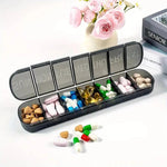Large capacity 7-day portable pill box container by TEMU with multiple compartments for medication and vitamin storage.
