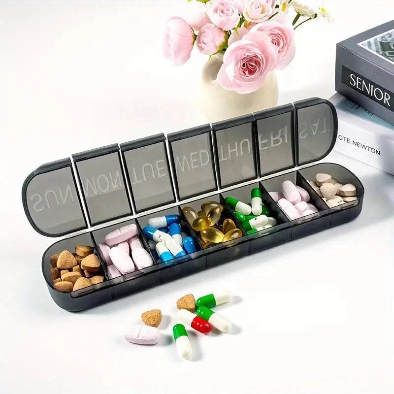 Large capacity 7-day portable pill box container by TEMU with multiple compartments for medication and vitamin storage.