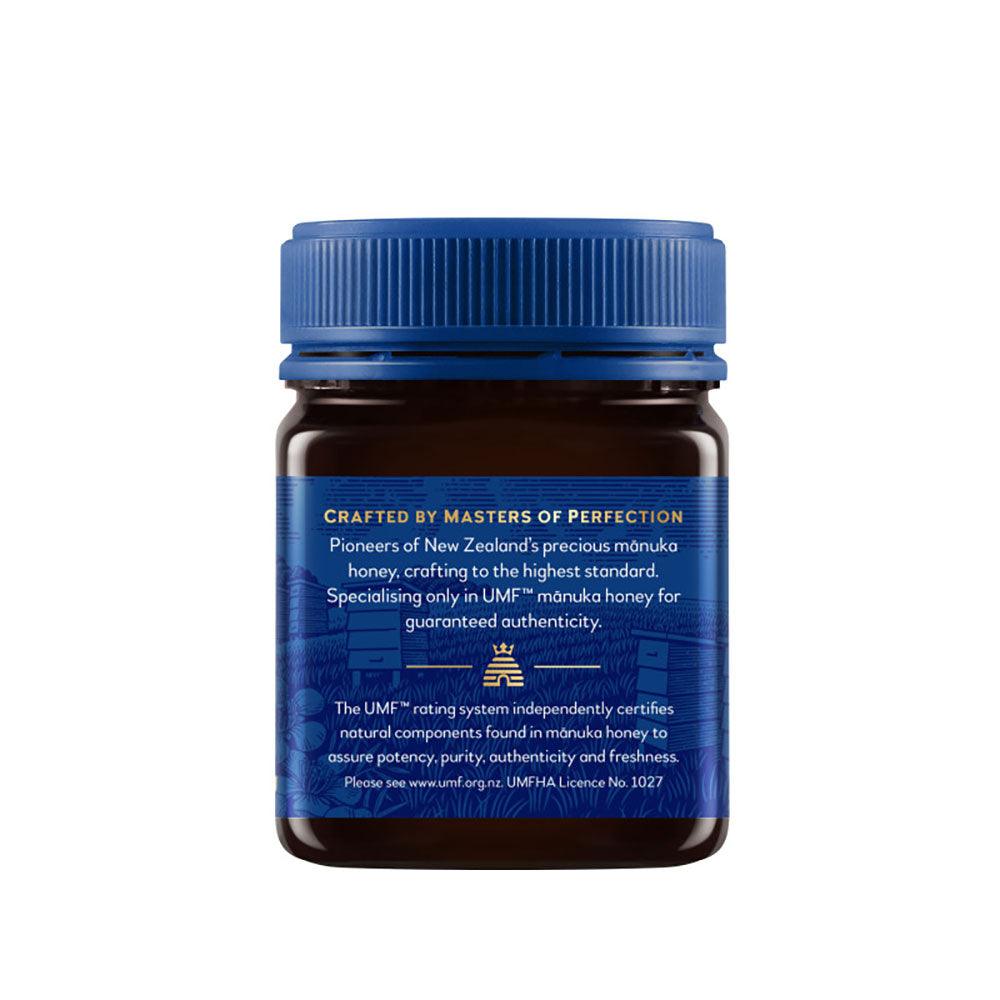 Herbalistas Haddrells Manuka Honey UMF13+ MGO404+ in 250g jar, showing golden honey with a smooth texture and label.