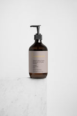 Selfnamed Patchouli & Amber Vanilla hand and body wash with rich, aromatic scent and moisturizing formula.