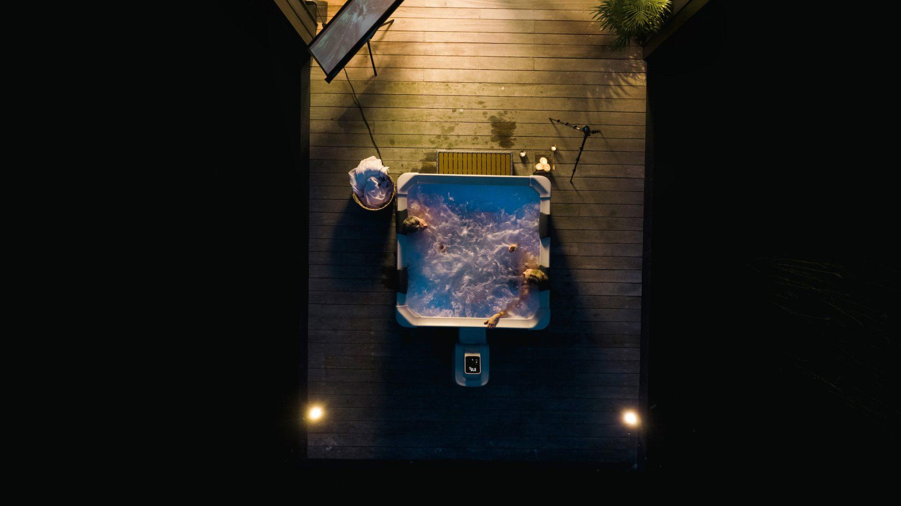 VIKING FITNESS MSpa Oslo outdoor hot tub with LED lighting, showing the modular spa's sleek design and comfortable seating.