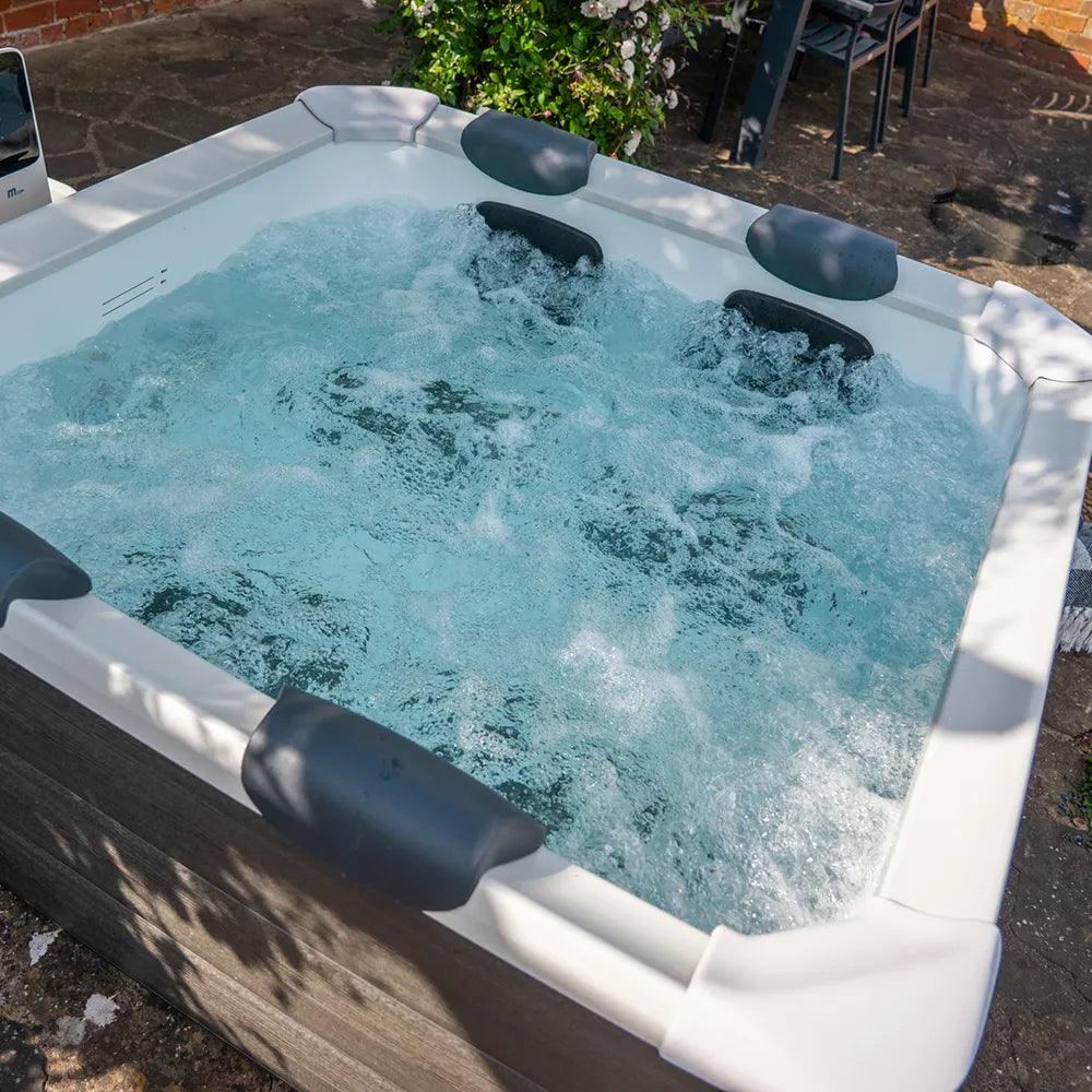 VIKING FITNESS MSpa Oslo modular outdoor hot tub with built-in seating and sleek design for relaxing spa experience outdoors.
