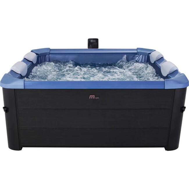 MSpa Oslo Sapphire outdoor hot tub with blue acrylic interior and built-in seating, ideal for relaxing outdoor spa experiences.