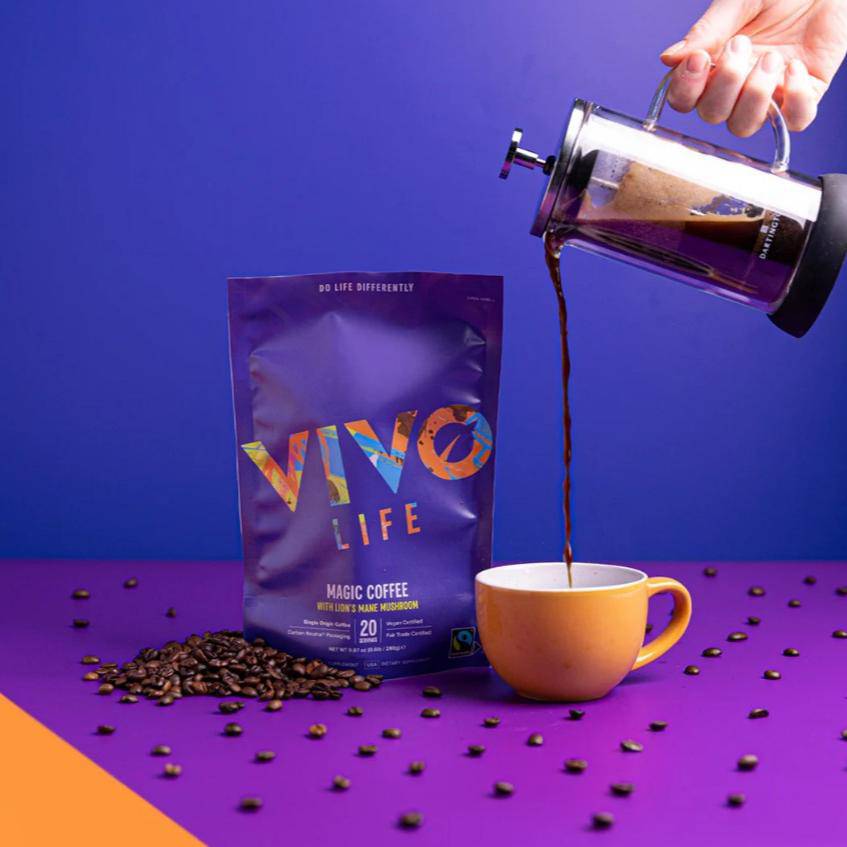 Vivo Life Magic Organic Coffee with lion’s mane mushroom in a coffee mug, showcasing a natural, herbal coffee blend.