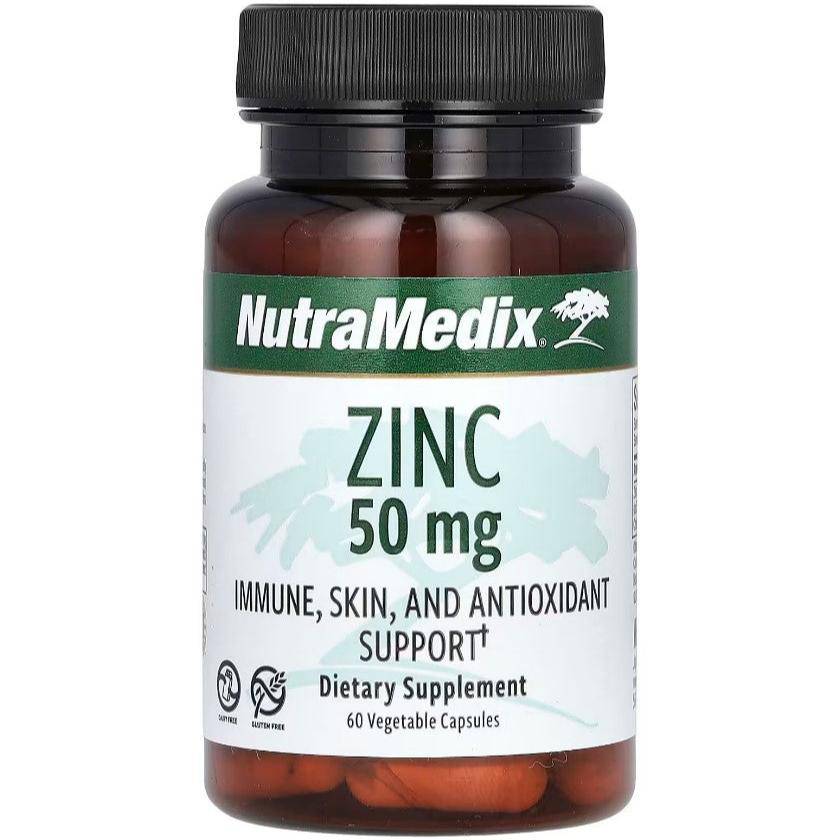 Vegetable capsules of Zinc supplement by OLD PRODUCTS, 50 mg zinc per capsule, arranged in a row on a white background.