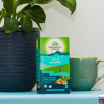 Organic India BIO Tulsi Tea by Herbalistas, caffeine-free cleanse tea in 25 infusion bags, featuring fresh herbal tea leaves and packaging.