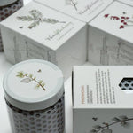 LV Natural Foods superfood gift box with six 50g packages of premium healthy snacks, neatly arranged in a decorative box.