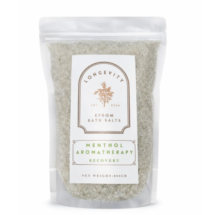 Green Epsom bath salt jar labeled Longevity Menthol Aromatherapy Recovery by AW GIFTS with a green and white design.