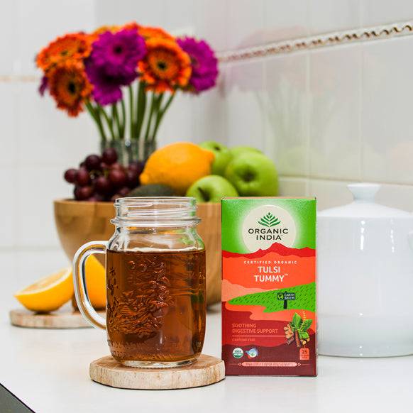 Organic India Tulsi Tea Tummy herbal infusion bags, caffeine-free, with fresh herbal leaves for soothing digestion.