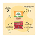 Organic India BIO Moringa and Hibiscus tea infusion bags, featuring vibrant hibiscus flowers and green moringa leaves.