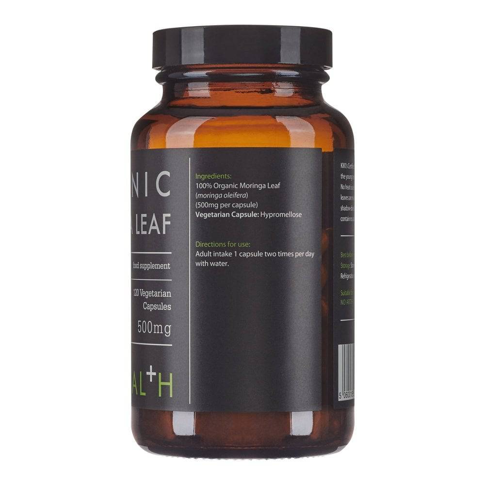 Organic Moringa supplement by Kiki Health in 120 vegan capsules, showing green moringa leaf capsules in a natural setting.