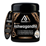Herbalistas MountainDrop Shilajit 25g blend with Ashwagandha and raw chestnut honey, displayed in a jar with a scoop.