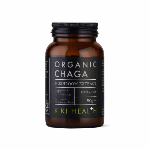 Organic Kiki Health Chaga Mushroom Extract Powder supplement in a jar, showing the powder's texture and natural appearance.