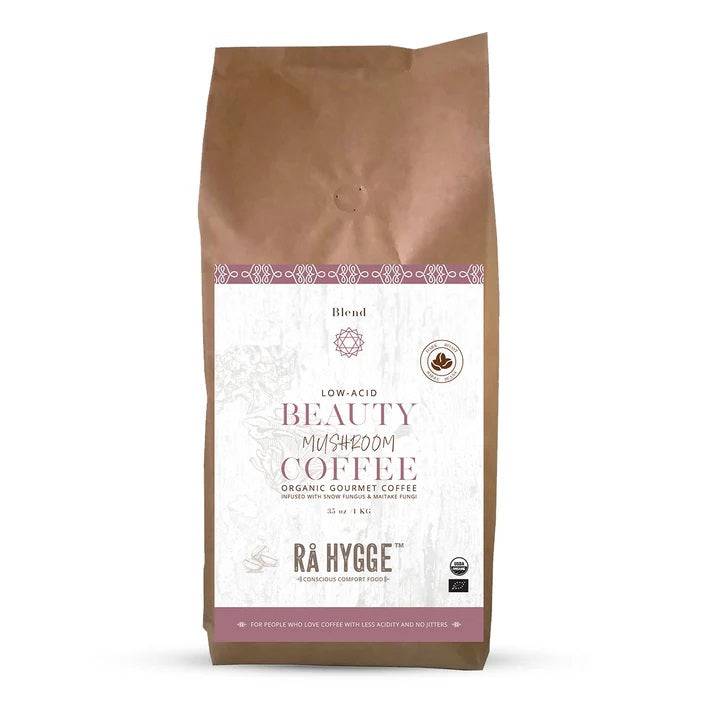 Whole beans of Herbalistas Rå Hygge BIO Tremella and Maitake Mushroom Coffee in 1kg bag, showing the coffee beans and packaging.