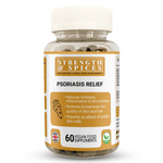Two white capsules of Psoriasis Relief 1000mg supplement by Strength & Spices, displayed on a plain background.