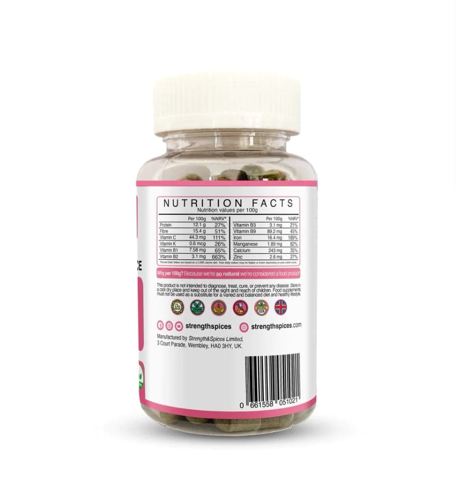 Bottle of STRENGTH & SPICES PMS Relief & Hormone Balance supplement capsules in a clear container, showing 60 capsules inside.